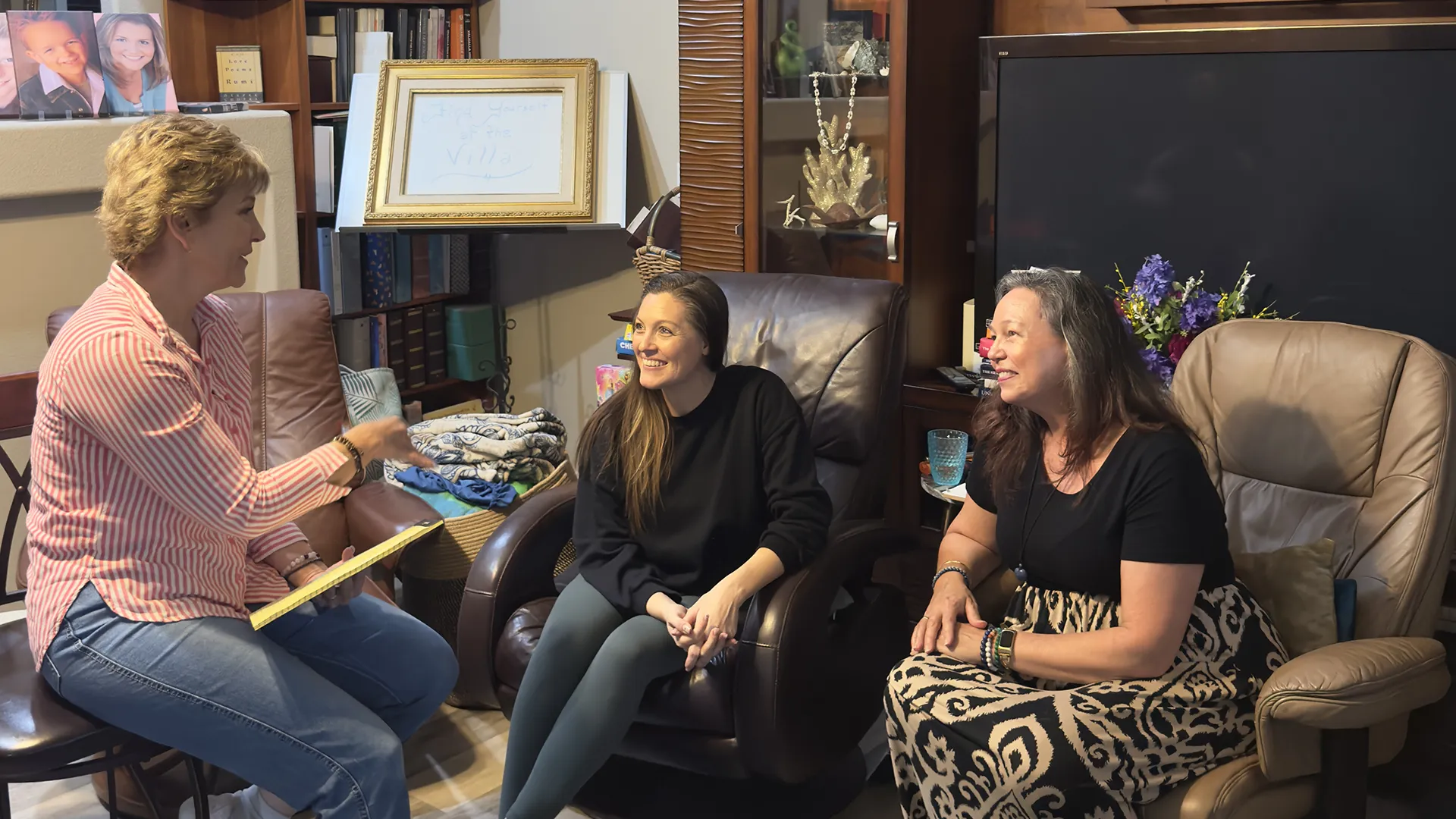 Mona speaking with a small group